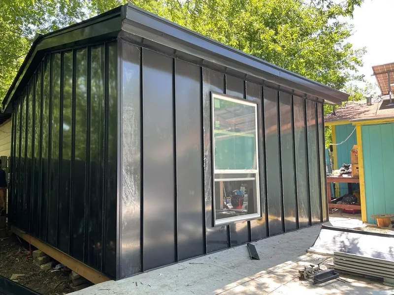 Black standing seam metal wall panels for Metal Roof Installation in Seminole